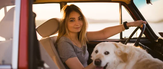 woman-with-her-dog-car